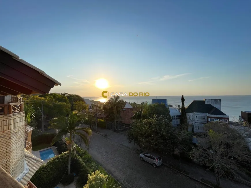 Foto 1 de Casa de Condomínio com 5 Quartos à venda, 240m² em Vila Assunção, Porto Alegre