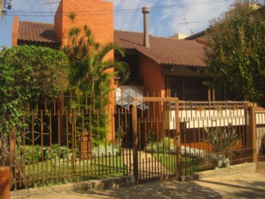Foto 1 de Casa com 3 Quartos à venda, 360m² em São Geraldo, Porto Alegre