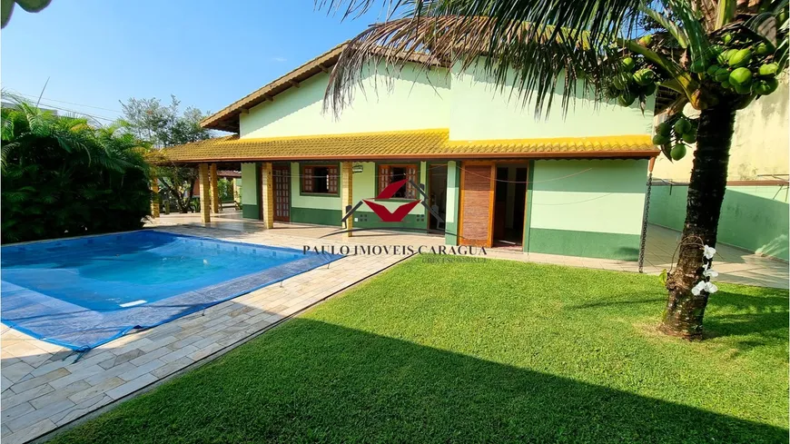 Foto 1 de Casa de Condomínio com 5 Quartos à venda, 213m² em Massaguaçu, Caraguatatuba
