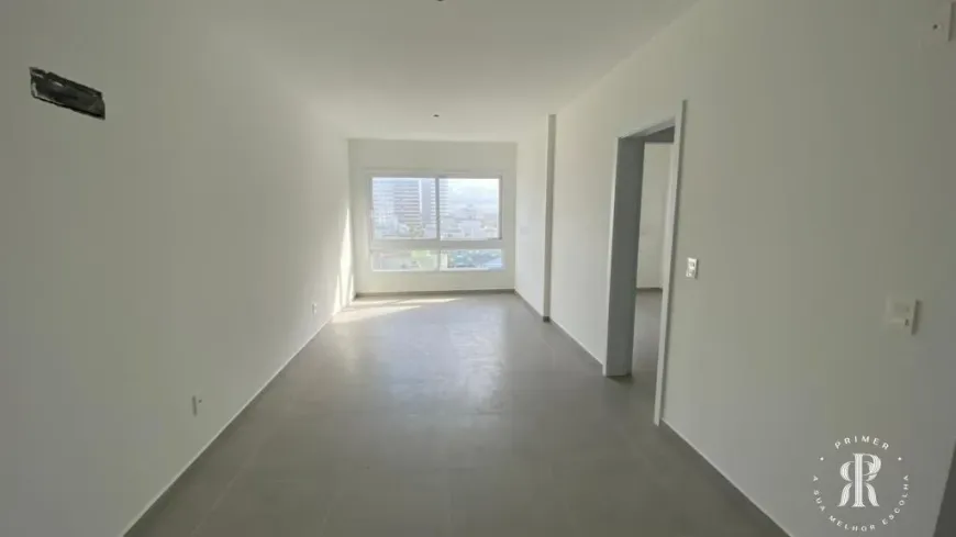 Foto 1 de Apartamento com 2 Quartos à venda, 66m² em Centro, Tramandaí