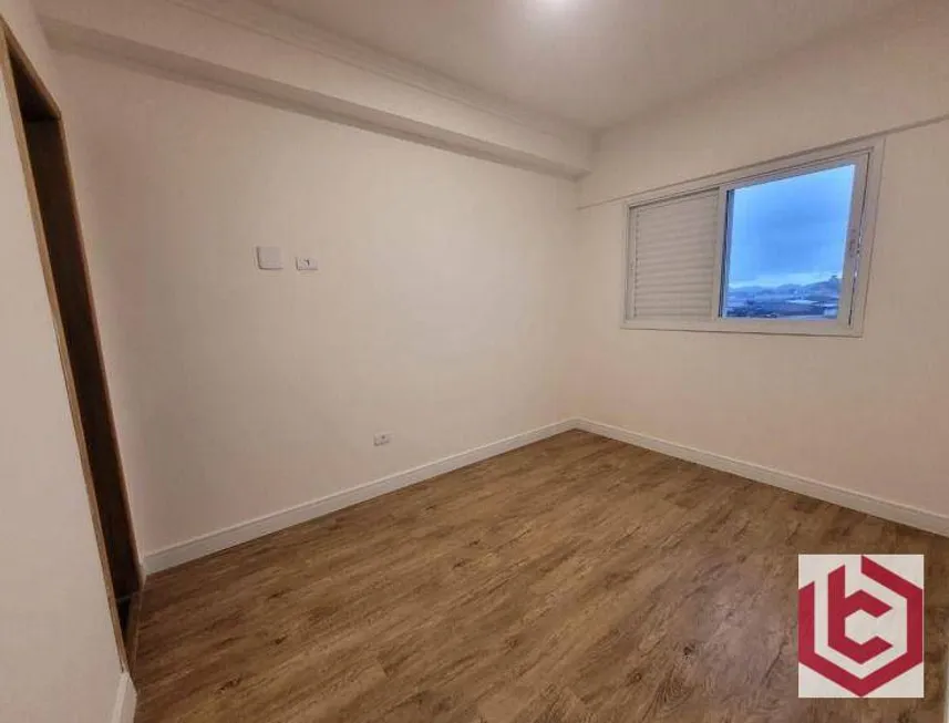 Foto 1 de Apartamento com 2 Quartos à venda, 52m² em Macuco, Santos