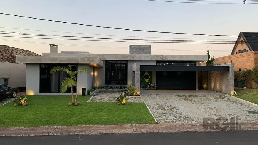 Foto 1 de Casa de Condomínio com 3 Quartos à venda, 345m² em Belém Novo, Porto Alegre