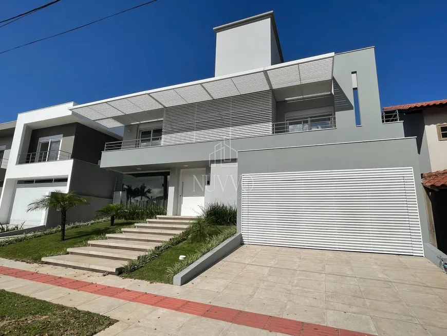 Foto 1 de Casa com 3 Quartos à venda, 450m² em Jurerê Internacional, Florianópolis