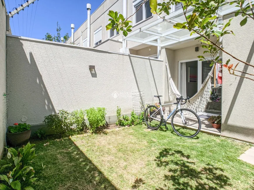 Foto 1 de Casa de Condomínio com 3 Quartos à venda, 120m² em Vila Nova, Porto Alegre