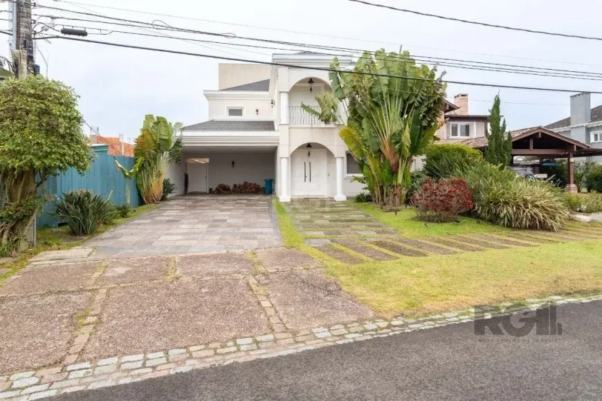 Foto 1 de Casa de Condomínio com 3 Quartos à venda, 419m² em Belém Novo, Porto Alegre