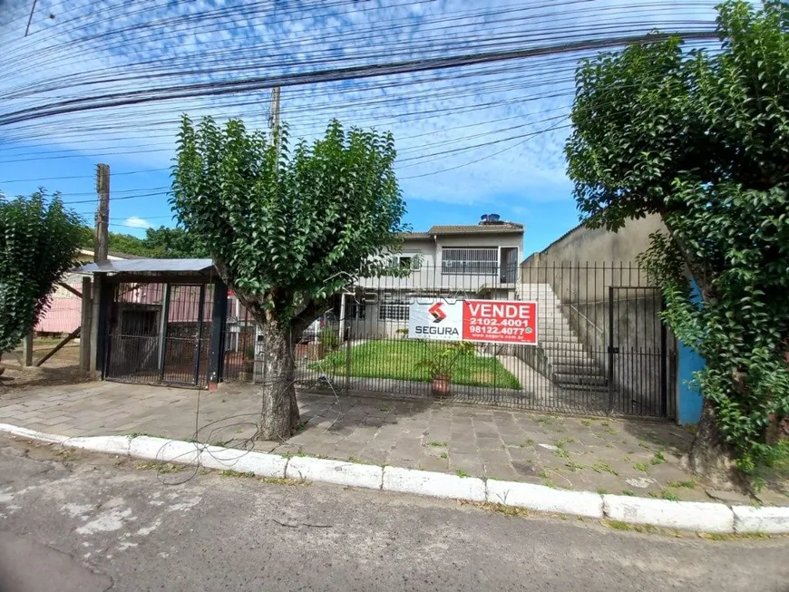 Foto 1 de Sobrado com 5 Quartos à venda, 198m² em Rio Branco, Canoas