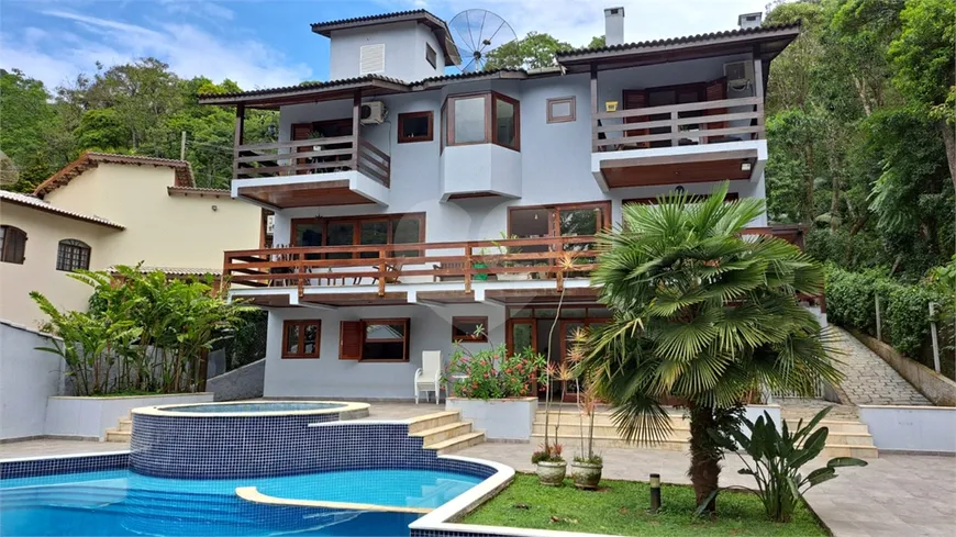 Foto 1 de Casa de Condomínio com 6 Quartos à venda, 355m² em Caraguata, Mairiporã