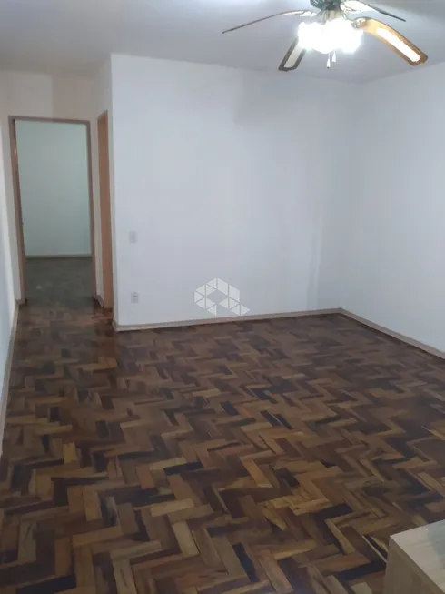 Foto 1 de Apartamento com 1 Quarto à venda, 50m² em Costa E Silva, Porto Alegre