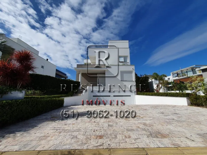 Foto 1 de Casa com 4 Quartos para venda ou aluguel, 500m² em Jurerê Internacional, Florianópolis