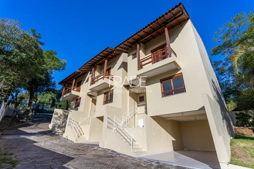 Foto 1 de Casa de Condomínio com 3 Quartos à venda, 110m² em Cavalhada, Porto Alegre