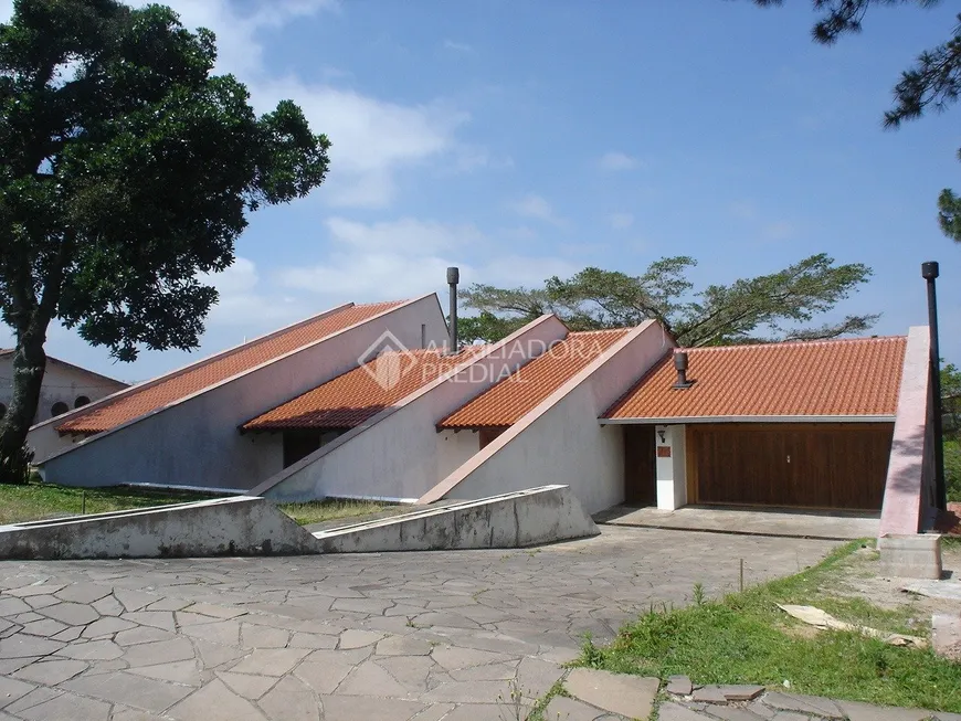 Foto 1 de Casa com 4 Quartos à venda, 516m² em Ipanema, Porto Alegre