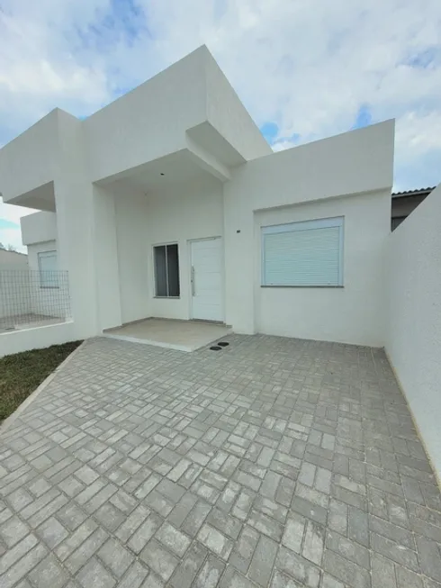 Foto 1 de Casa com 3 Quartos à venda, 98m² em Zona Nova, Capão da Canoa