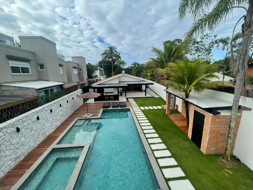 Foto 1 de Casa com 5 Quartos para venda ou aluguel, 400m² em Camburi, São Sebastião