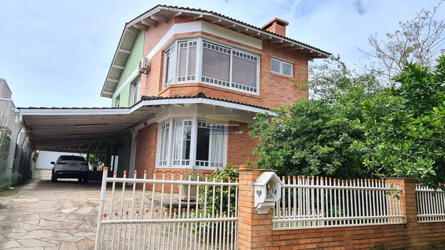 Foto 1 de Casa de Condomínio com 3 Quartos à venda, 270m² em Cantegril, Viamão