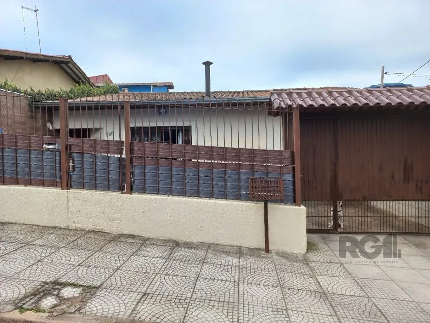 Foto 1 de Casa com 2 Quartos à venda, 88m² em Vila Nova, Porto Alegre