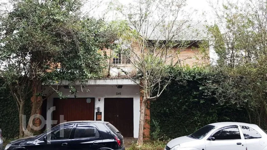 Foto 1 de Casa com 8 Quartos à venda, 527m² em Alto de Pinheiros, São Paulo