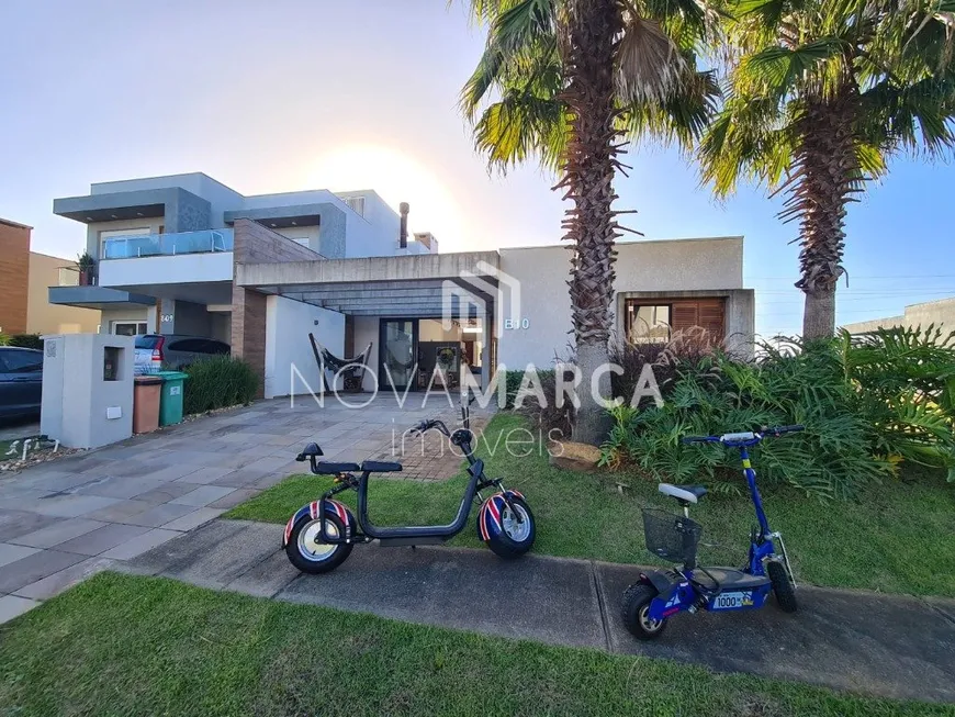 Foto 1 de Casa de Condomínio com 4 Quartos à venda, 185m² em Santa Luzia, Capão da Canoa