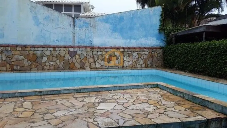 Foto 1 de Sobrado com 4 Quartos à venda, 507m² em Balneário Praia do Pernambuco, Guarujá