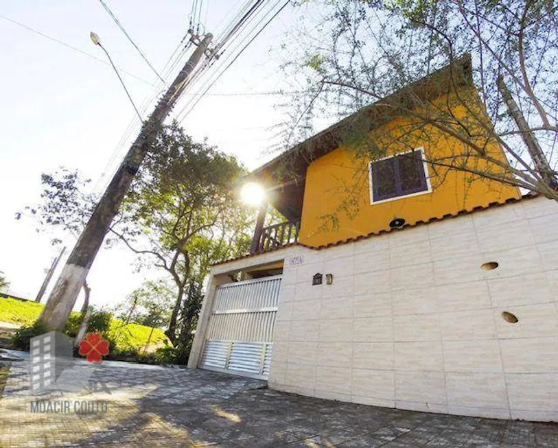 Foto 1 de Sobrado com 3 Quartos à venda, 132m² em Silop, Ubatuba