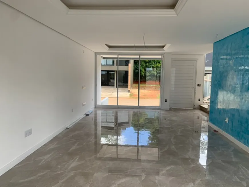Foto 1 de Casa de Condomínio com 4 Quartos à venda, 145m² em Jansen, Gravataí