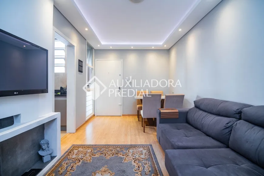 Foto 1 de Apartamento com 2 Quartos à venda, 57m² em Auxiliadora, Porto Alegre