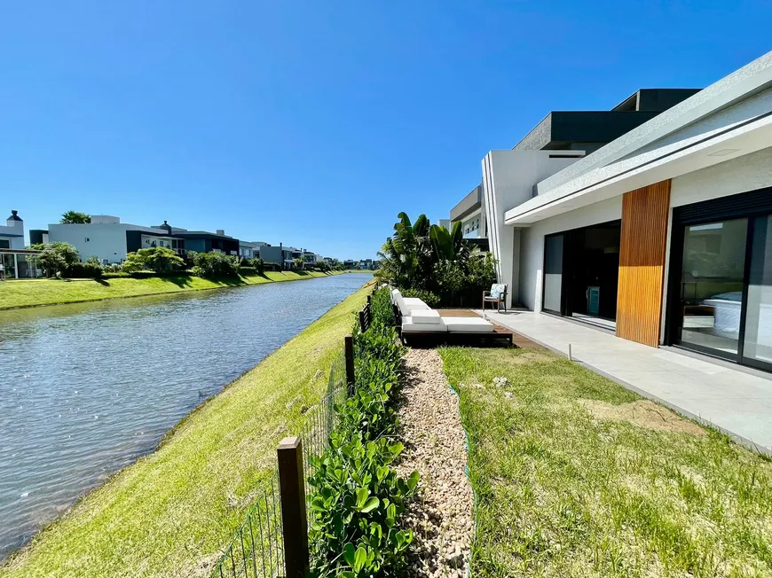 Foto 1 de Casa de Condomínio com 4 Quartos à venda, 200m² em Condominio Capao Ilhas Resort, Capão da Canoa