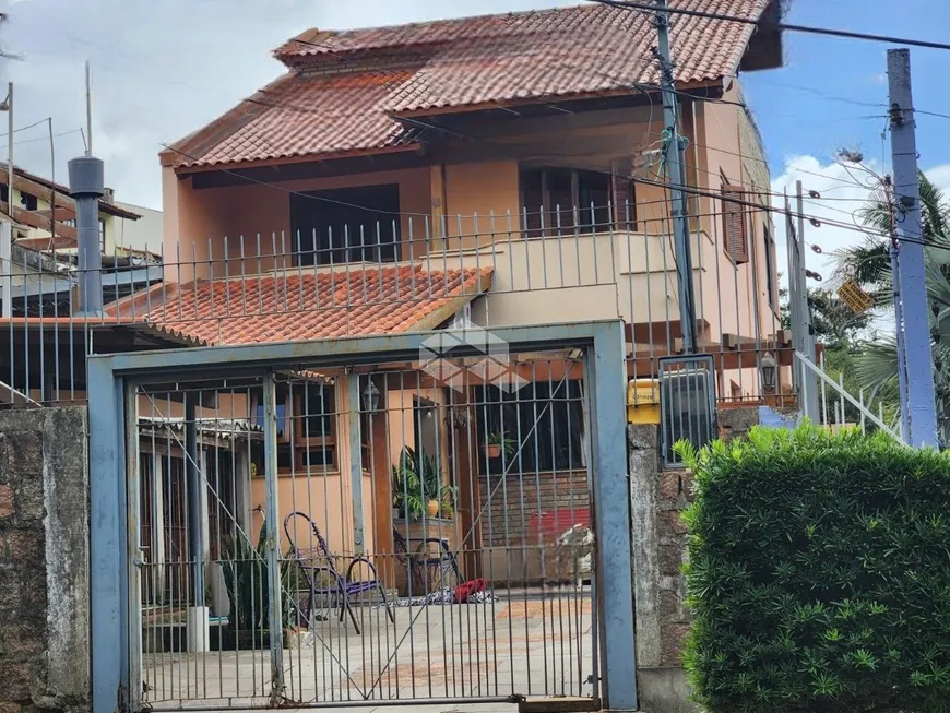 Foto 1 de Casa com 4 Quartos à venda, 300m² em Teresópolis, Porto Alegre