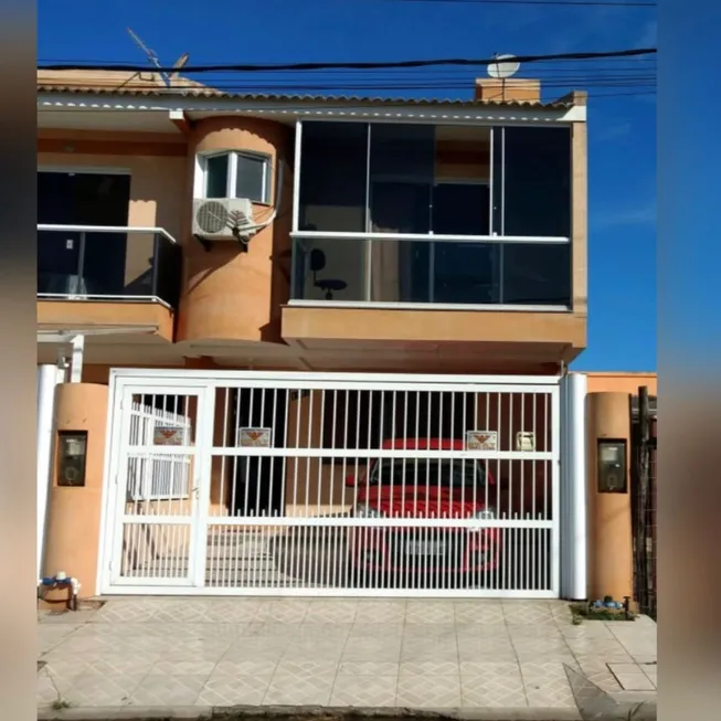 Foto 1 de Sobrado com 3 Quartos à venda, 120m² em Centro, Tramandaí