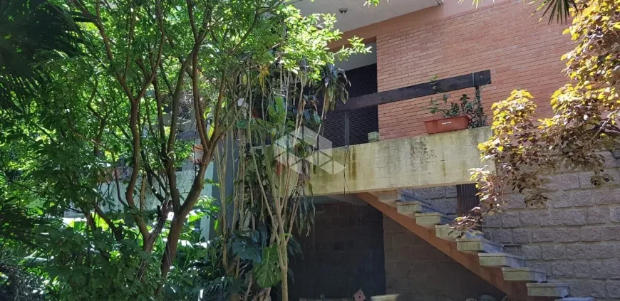 Foto 1 de Casa com 4 Quartos à venda, 419m² em Vila Assunção, Porto Alegre