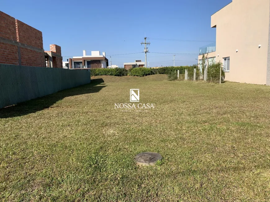 Foto 1 de Lote/Terreno à venda, 420m² em Centro, Torres