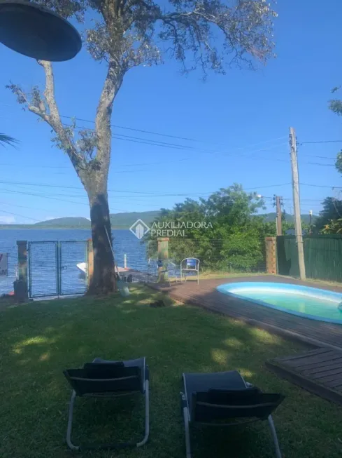 Foto 1 de Casa com 1 Quarto à venda, 91m² em Lagoa da Conceição, Florianópolis