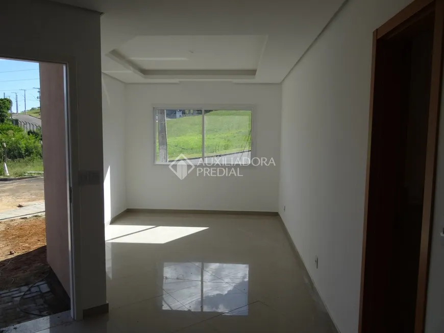 Foto 1 de Casa com 3 Quartos à venda, 112m² em Mário Quintana, Porto Alegre