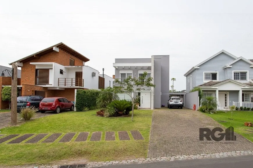 Foto 1 de Casa de Condomínio com 3 Quartos à venda, 268m² em Belém Novo, Porto Alegre