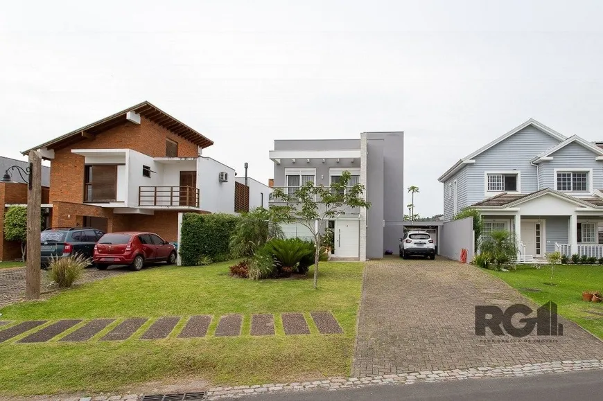 Foto 1 de Casa de Condomínio com 3 Quartos à venda, 270m² em Belém Novo, Porto Alegre