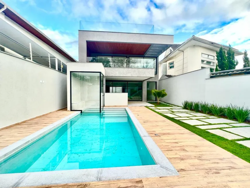 Foto 1 de Casa com 4 Quartos à venda, 350m² em Barra da Tijuca, Rio de Janeiro