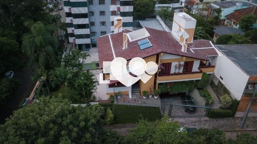 Foto 1 de Casa com 5 Quartos à venda, 574m² em Jardim Itú Sabará, Porto Alegre