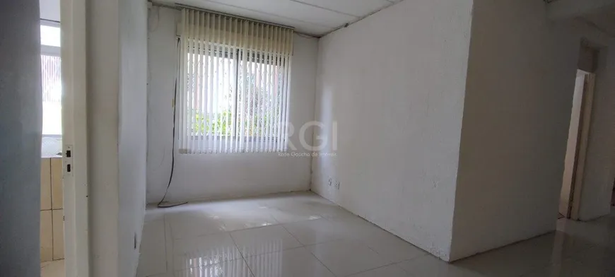 Foto 1 de Apartamento com 3 Quartos à venda, 70m² em Vila Nova, Porto Alegre