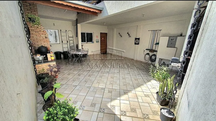 Foto 1 de Casa com 2 Quartos à venda, 76m² em Vila Suica, Santo André