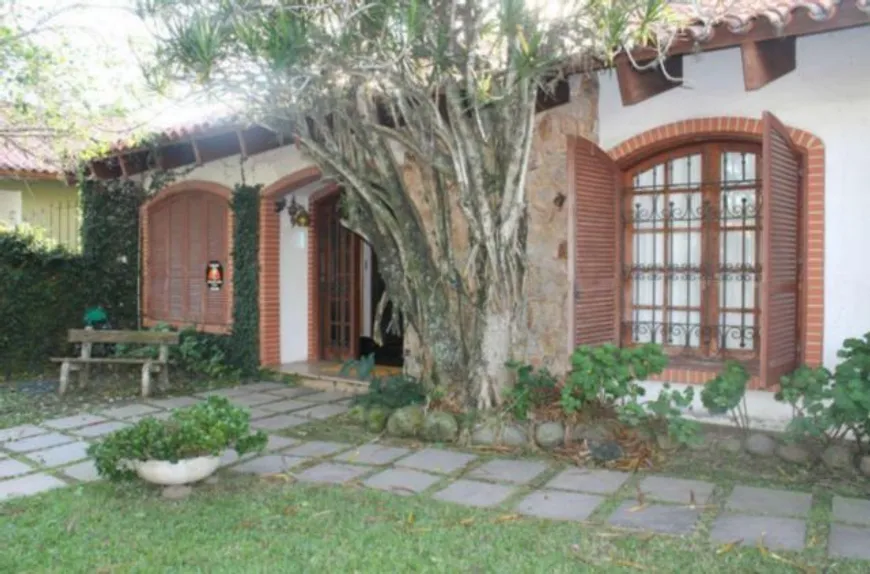 Foto 1 de Casa com 4 Quartos à venda, 299m² em Vila Assunção, Porto Alegre