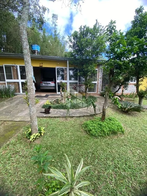 Foto 1 de Casa com 3 Quartos à venda, 200m² em Cocão, Viamão