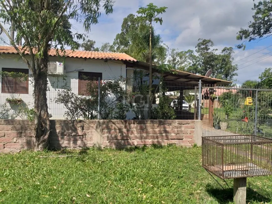 Foto 1 de Casa com 4 Quartos à venda, 122m² em Sao Caetano, Porto Alegre