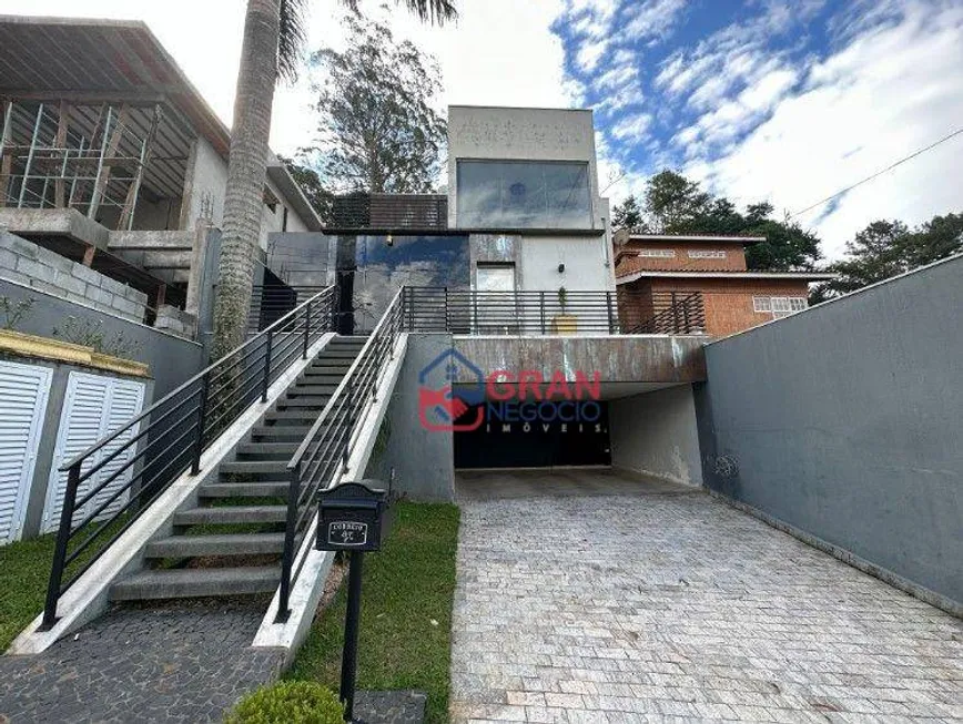 Foto 1 de Casa de Condomínio com 5 Quartos à venda, 294m² em Arujá Country Club, Itaquaquecetuba