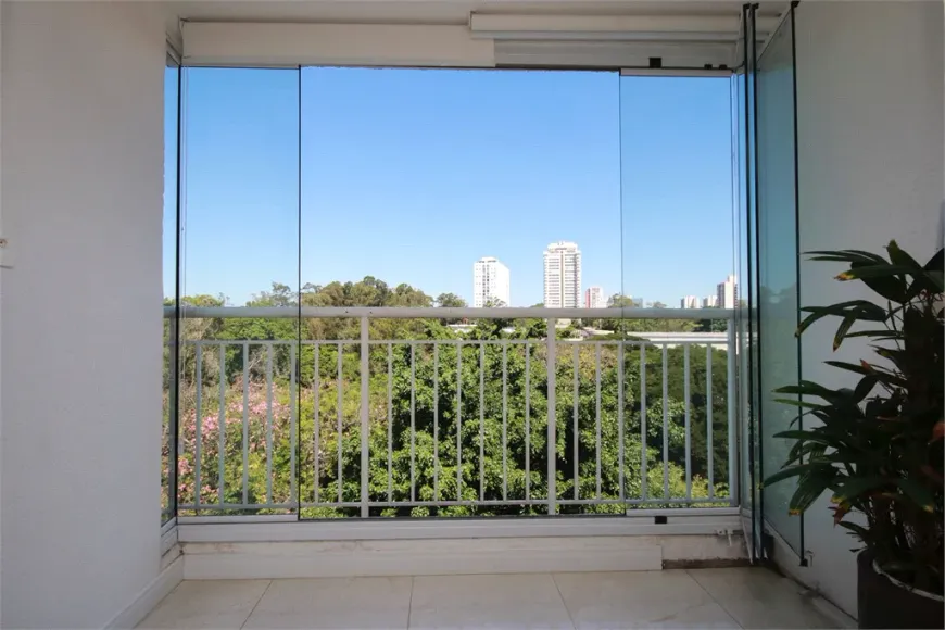 Foto 1 de Apartamento com 2 Quartos à venda, 66m² em Santo Amaro, São Paulo