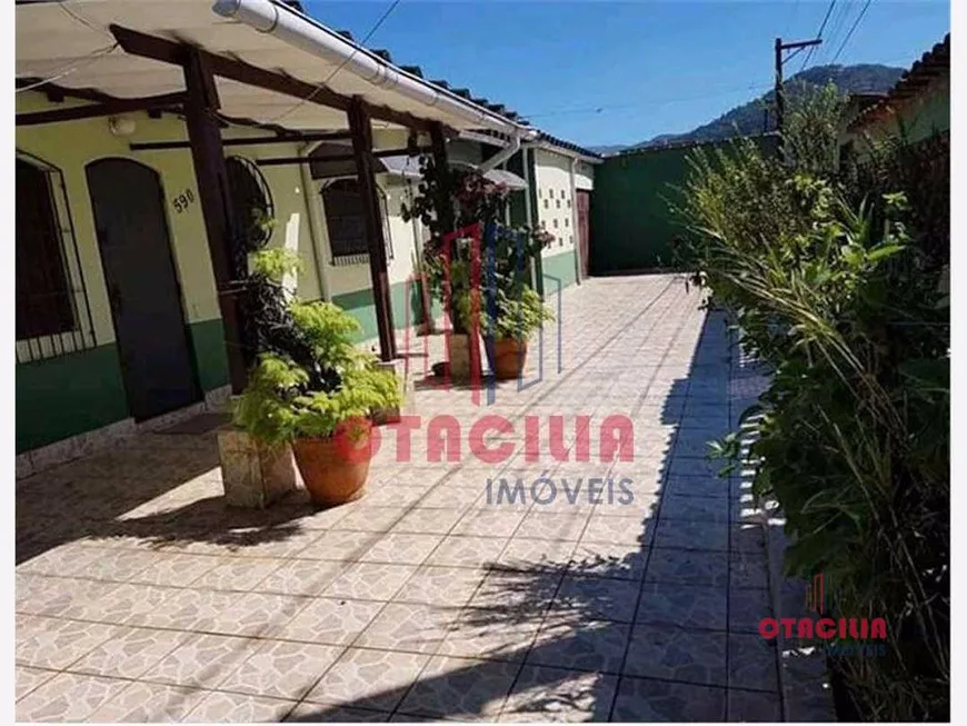 Foto 1 de Casa com 3 Quartos à venda, 98m² em Nossa Senhora de Fatima, Mongaguá