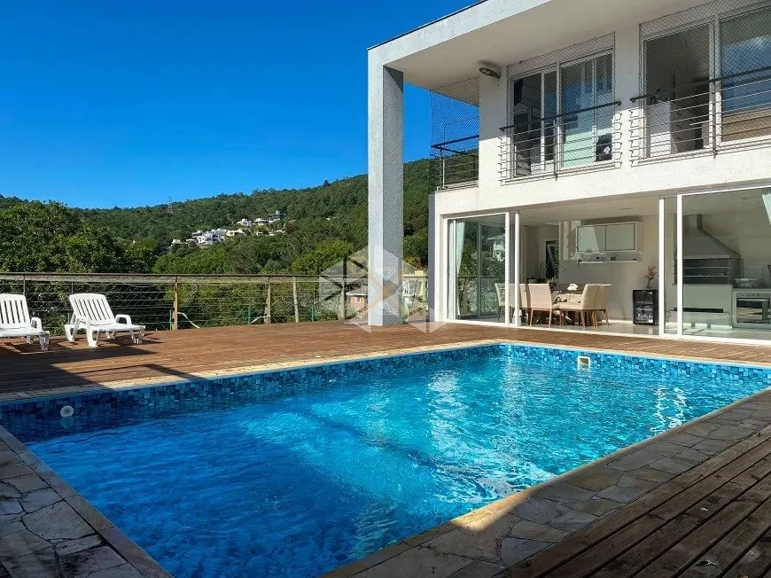 Foto 1 de Casa de Condomínio com 4 Quartos à venda, 344m² em Itacorubi, Florianópolis