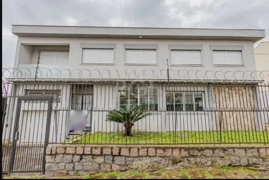 Foto 1 de Casa com 3 Quartos à venda, 219m² em Partenon, Porto Alegre