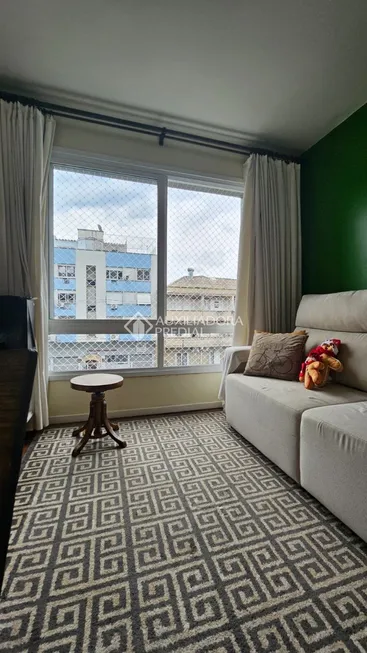 Foto 1 de Apartamento com 1 Quarto à venda, 43m² em Santo Antônio, Porto Alegre