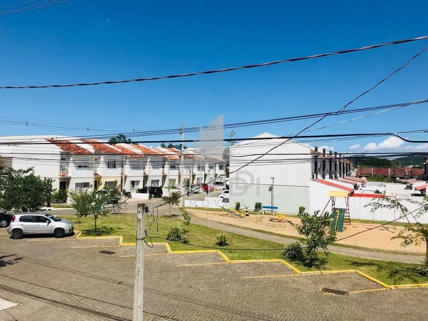 Foto 1 de Casa de Condomínio com 3 Quartos à venda, 144m² em Hípica, Porto Alegre