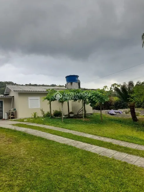 Foto 1 de Casa com 4 Quartos à venda, 160m² em Praia da Gamboa, Paulo Lopes