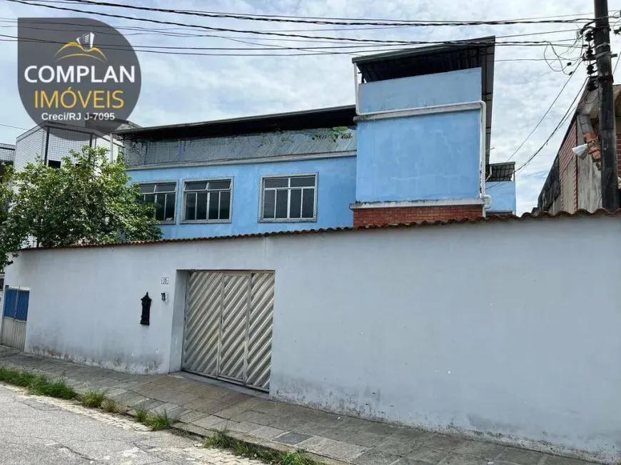 Foto 1 de Casa com 4 Quartos para venda ou aluguel, 308m² em Jardim Guanabara, Rio de Janeiro